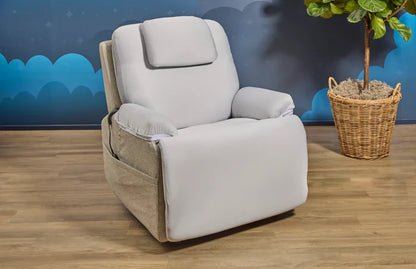Light gray recliner chair with padded arms and headrest, fabric upholstery.