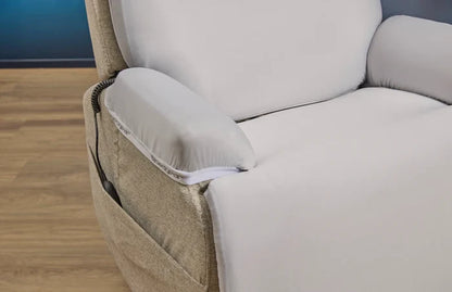 Close-up of light gray recliner arm and seat cushion with curved stitching detail.